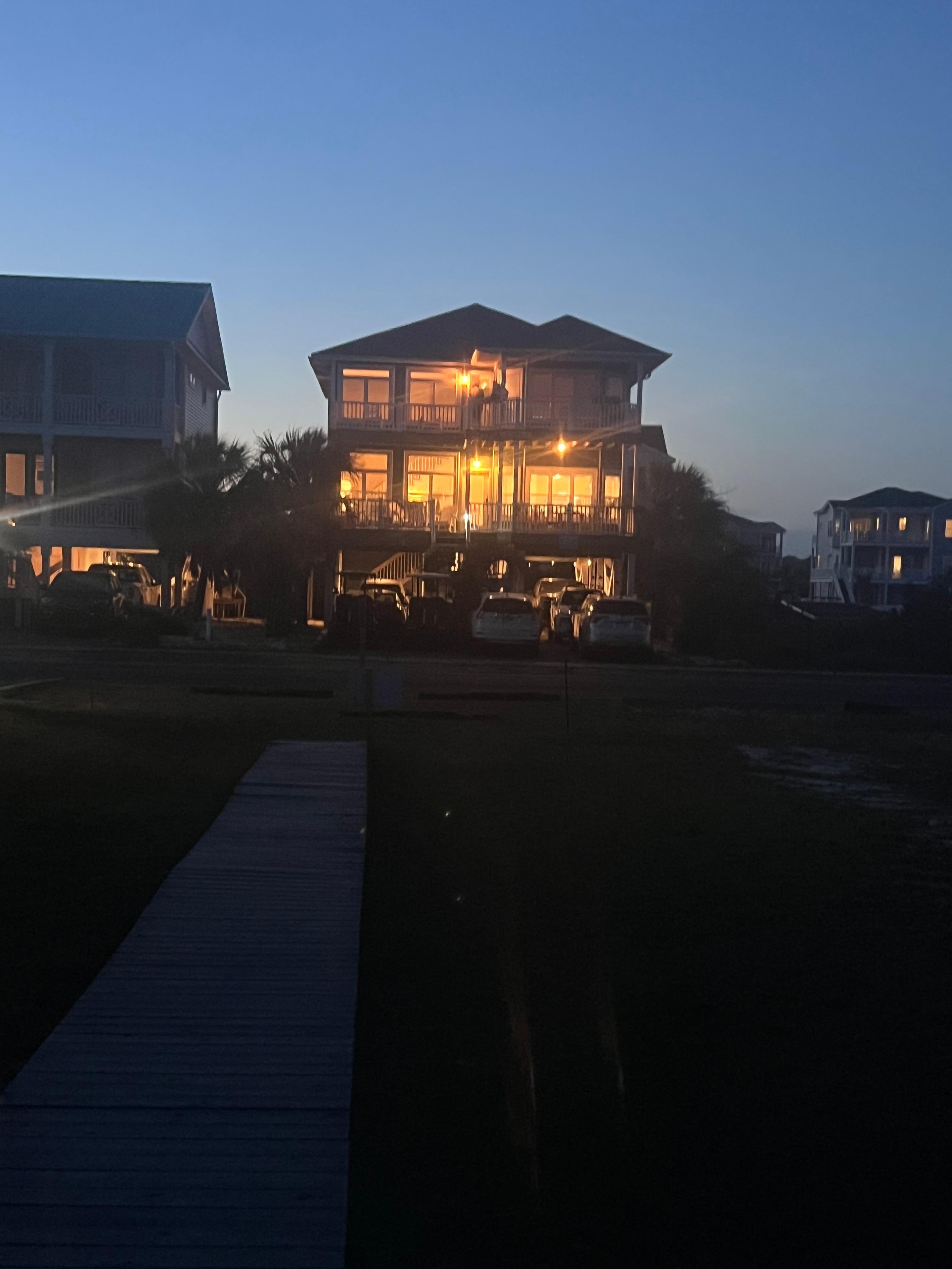 Night view of house. 