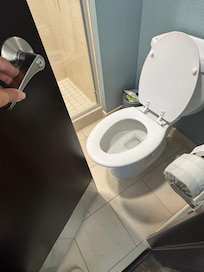 Door practically hits toilet