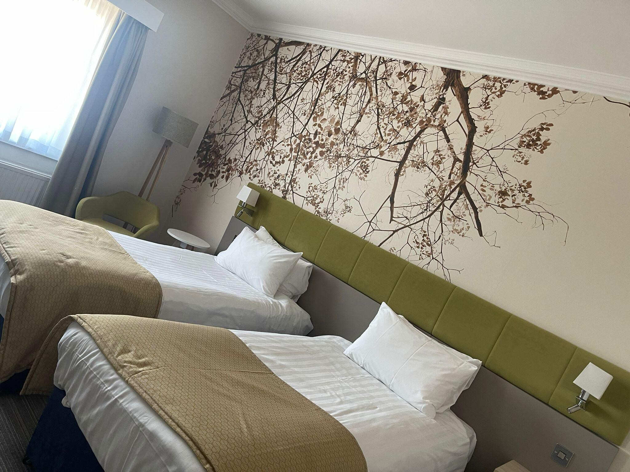 Lovely size and decorated room, comfy beds.