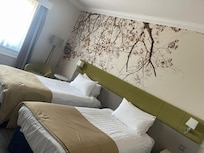 Lovely size and decorated room, comfy beds.