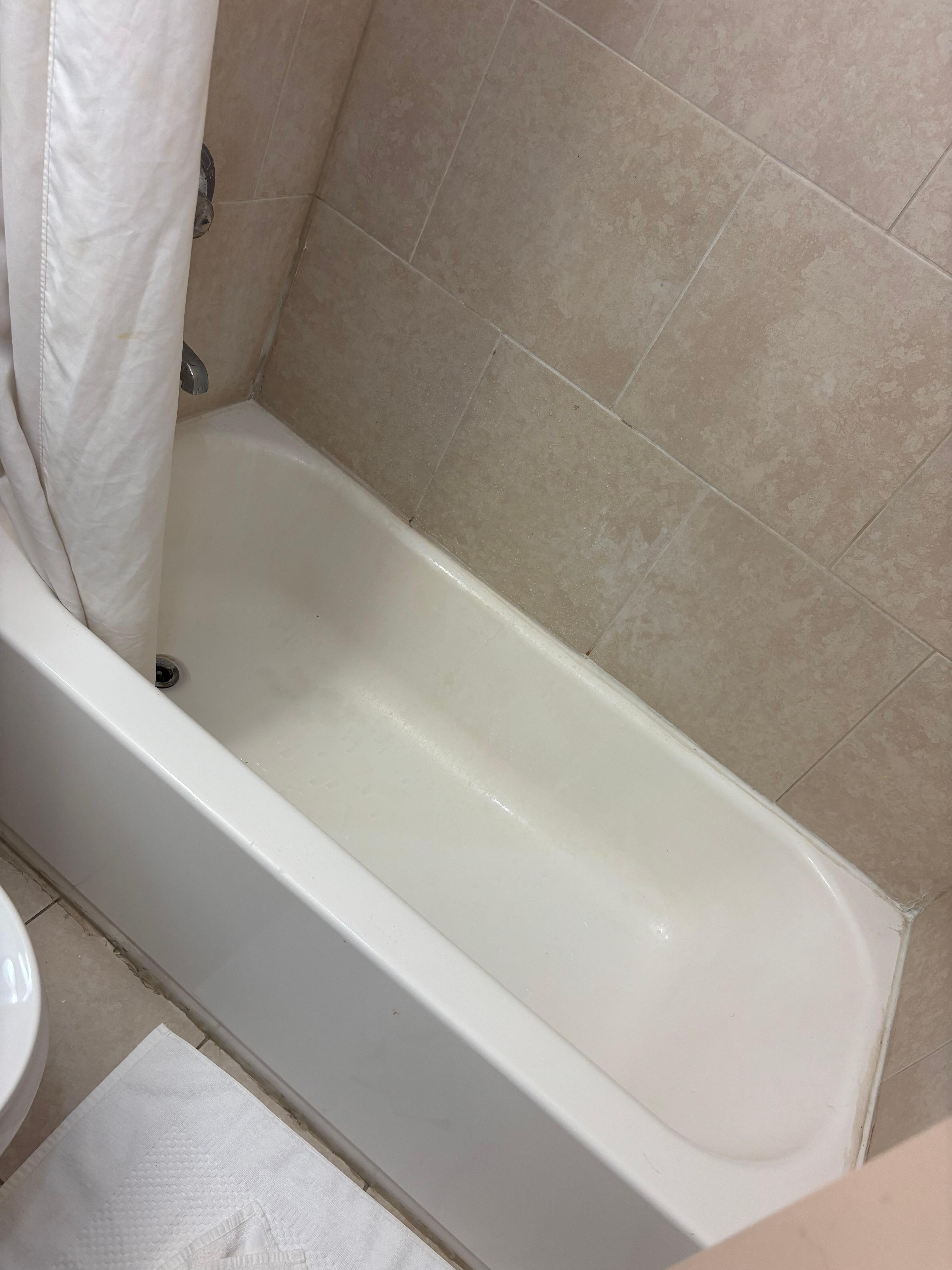 The yellowish tint to the bathtub 