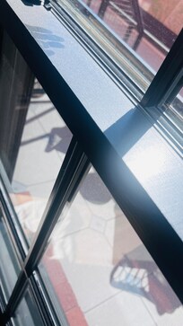 The pull for the blinds was broken and we had to stand on a stool to open the shades. The ledges on the windows needed to be wiped down and had handprints.