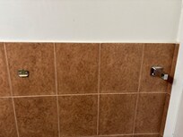 Broken towel bar, no other rack.