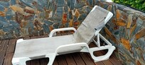 Stained and broken lounger.