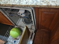 Not mounted, falling out of the cabinets, Will tip over when the racks are rolled out.