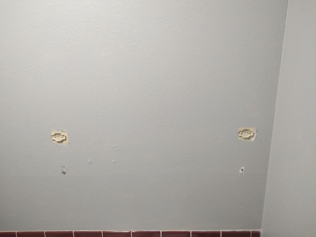 The towel rack was gone.