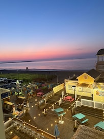Right next to tiki hut/ pier