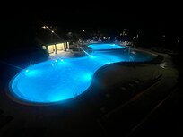 The pool area at night!