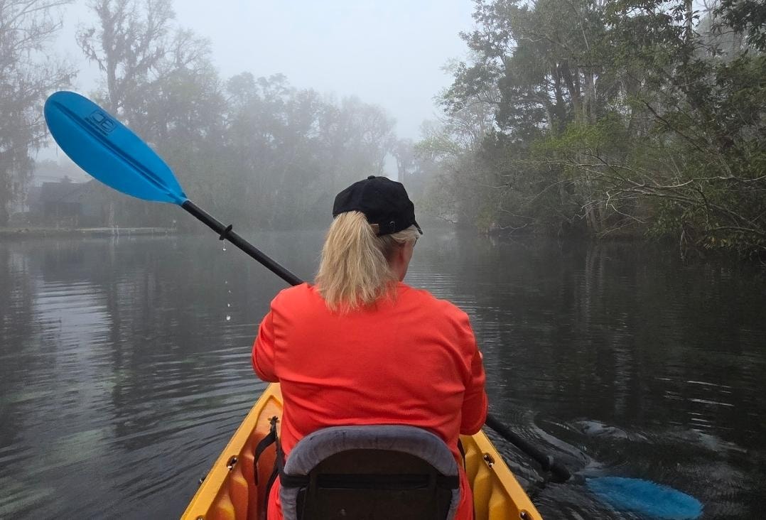 Kayaking in the morning fog