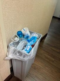 Overflowing trash not emptied all weekend
