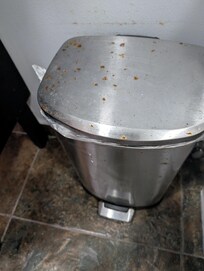 Rusty garbage can