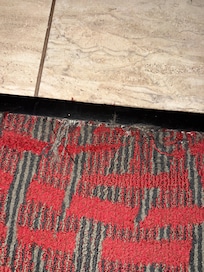 Frayed carpet