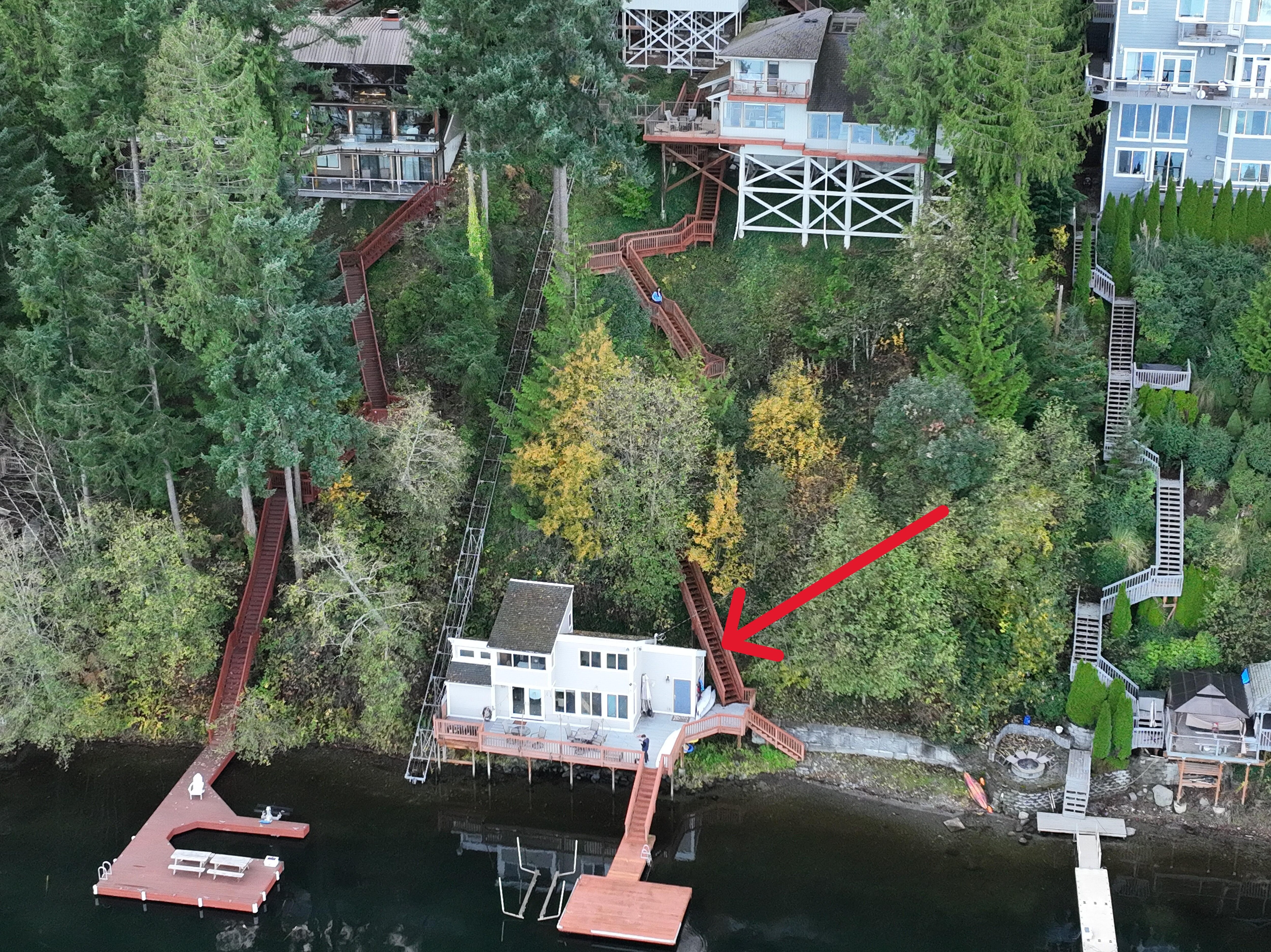 The home is very private and on the water. There is a tram that will take you up/down or you can climb the stairs.