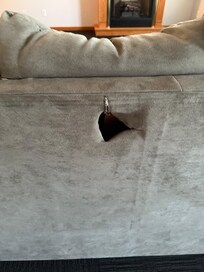 Large hole and ripped sofa, similar to above sofa