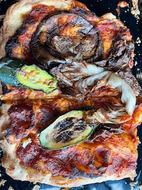 Penza Romagna with grilled vegetables and radicchio.