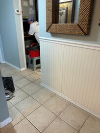 Service technician cleaning the ac for a long time