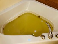 The jacuzzi tub in the upper level bathroom