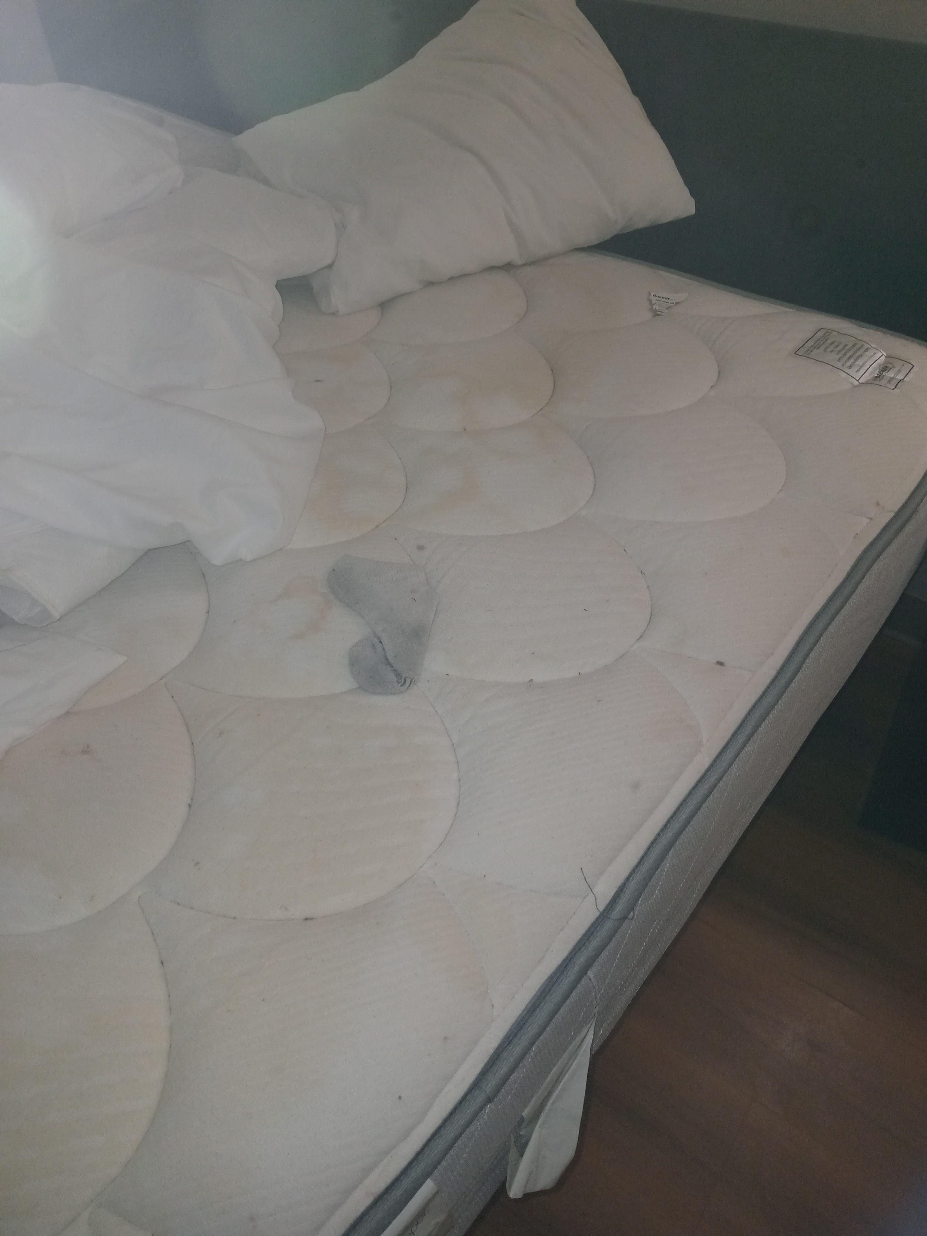 Dirty sock and mattress 