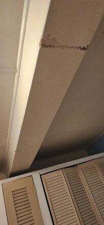 Master bedroom ceiling stained and water damage .