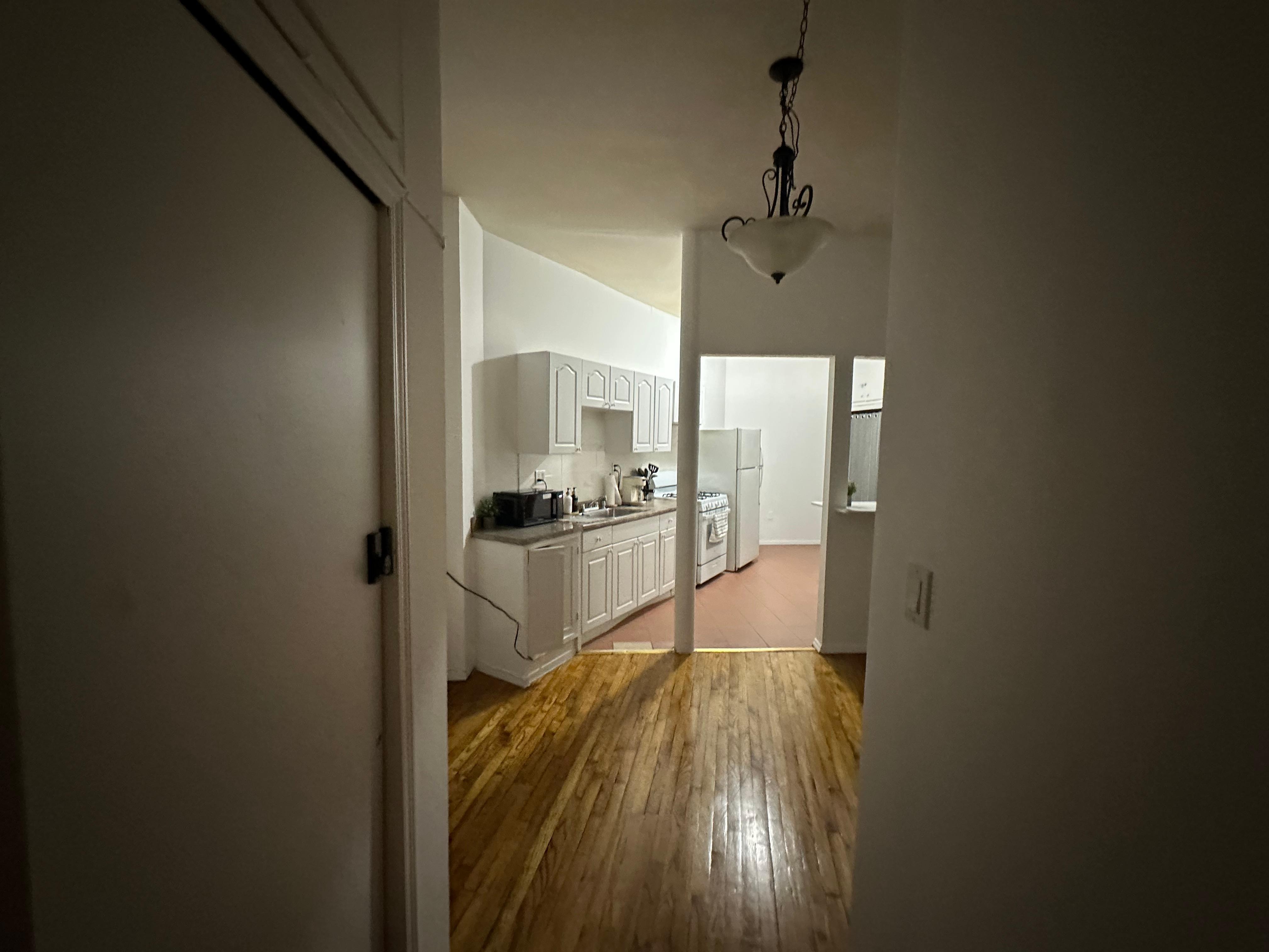 Looking down hall into common areas from Room 1&2