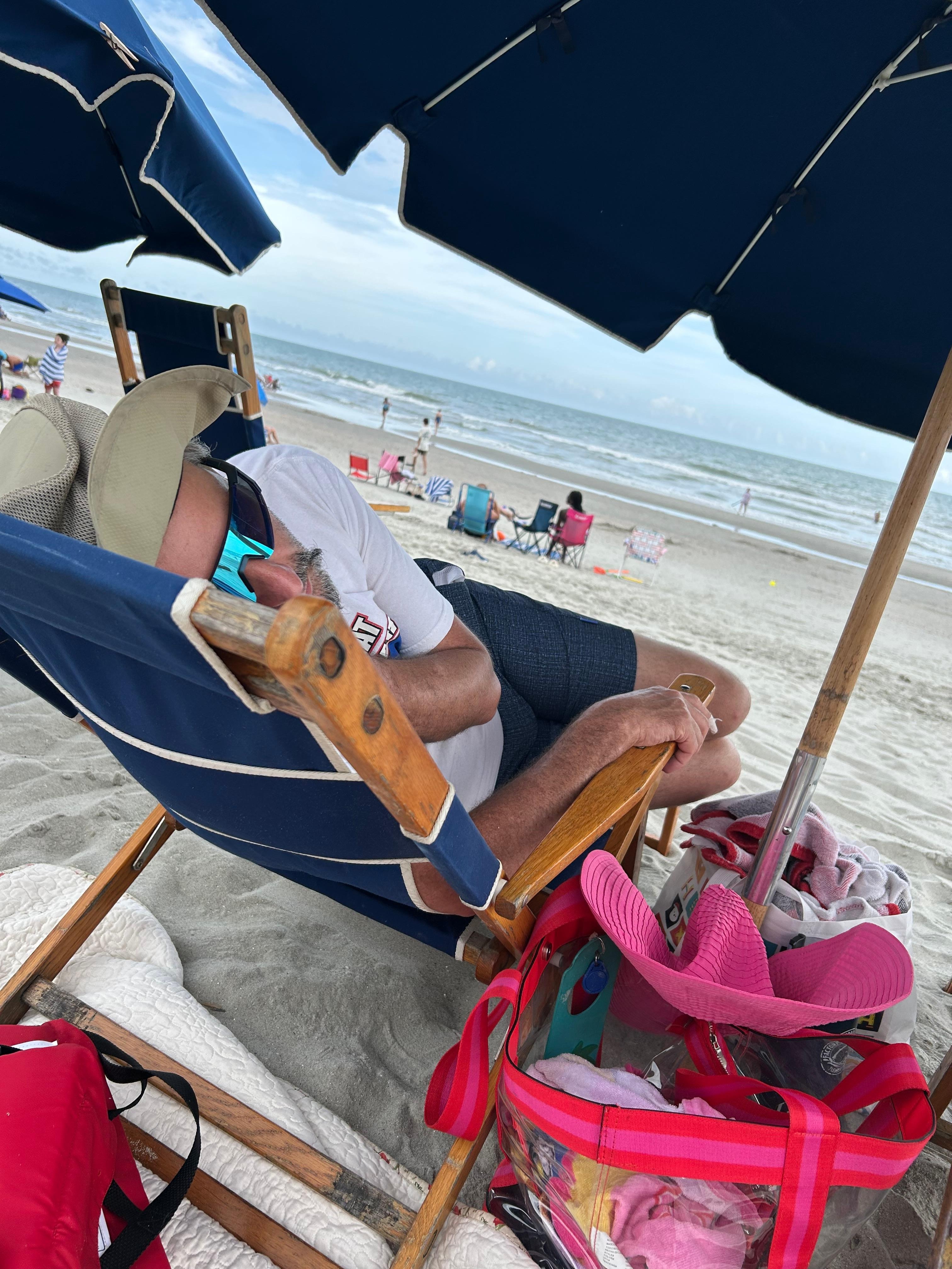 Hubby relaxing on the beach