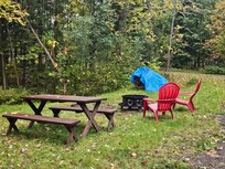 A place for a fire with plenty of wood and the owners left the fixings for s'mores!