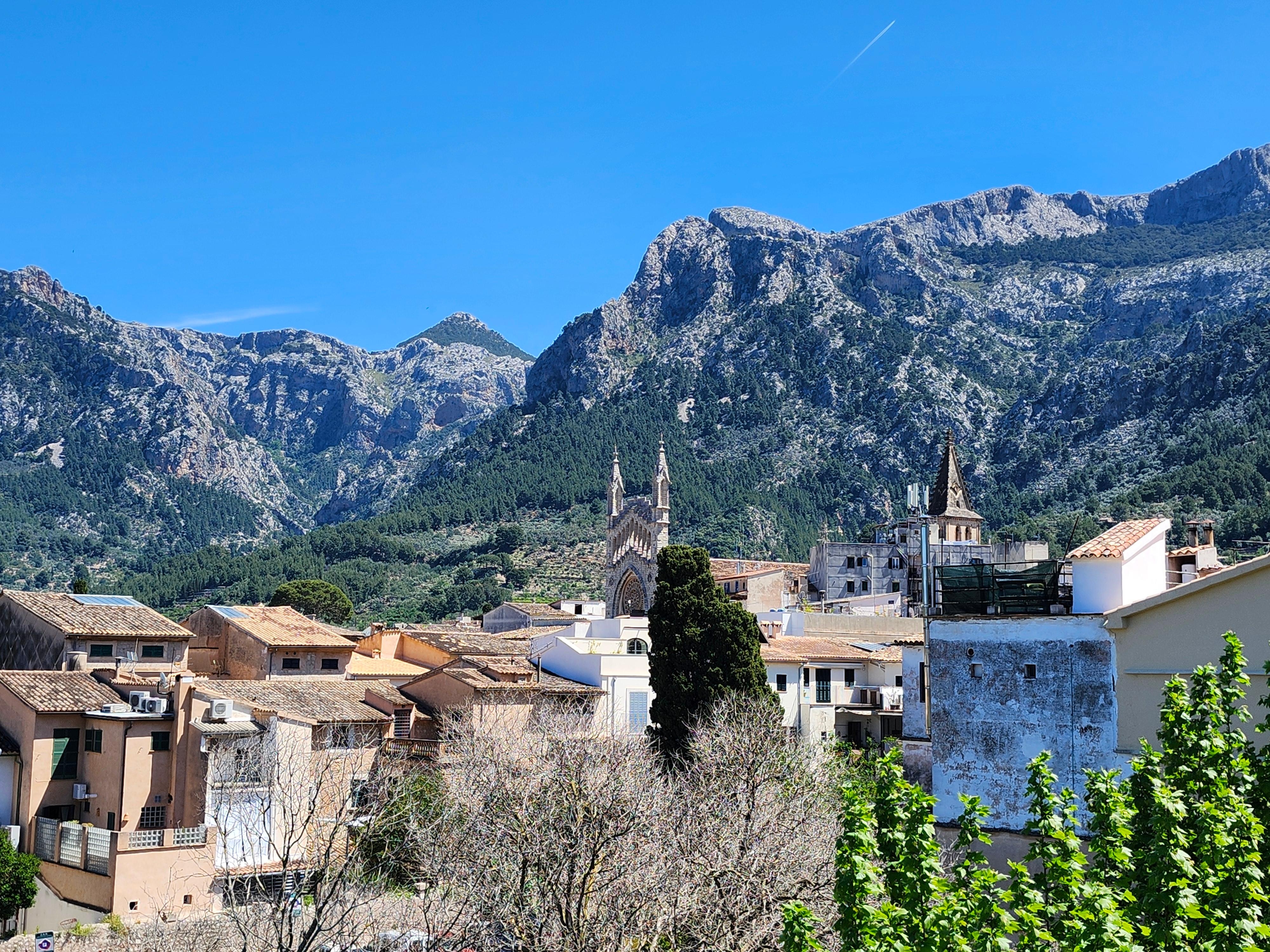 Room with view of mountains and old town
