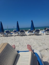 Relaxing in the beach chairs provided with the condo