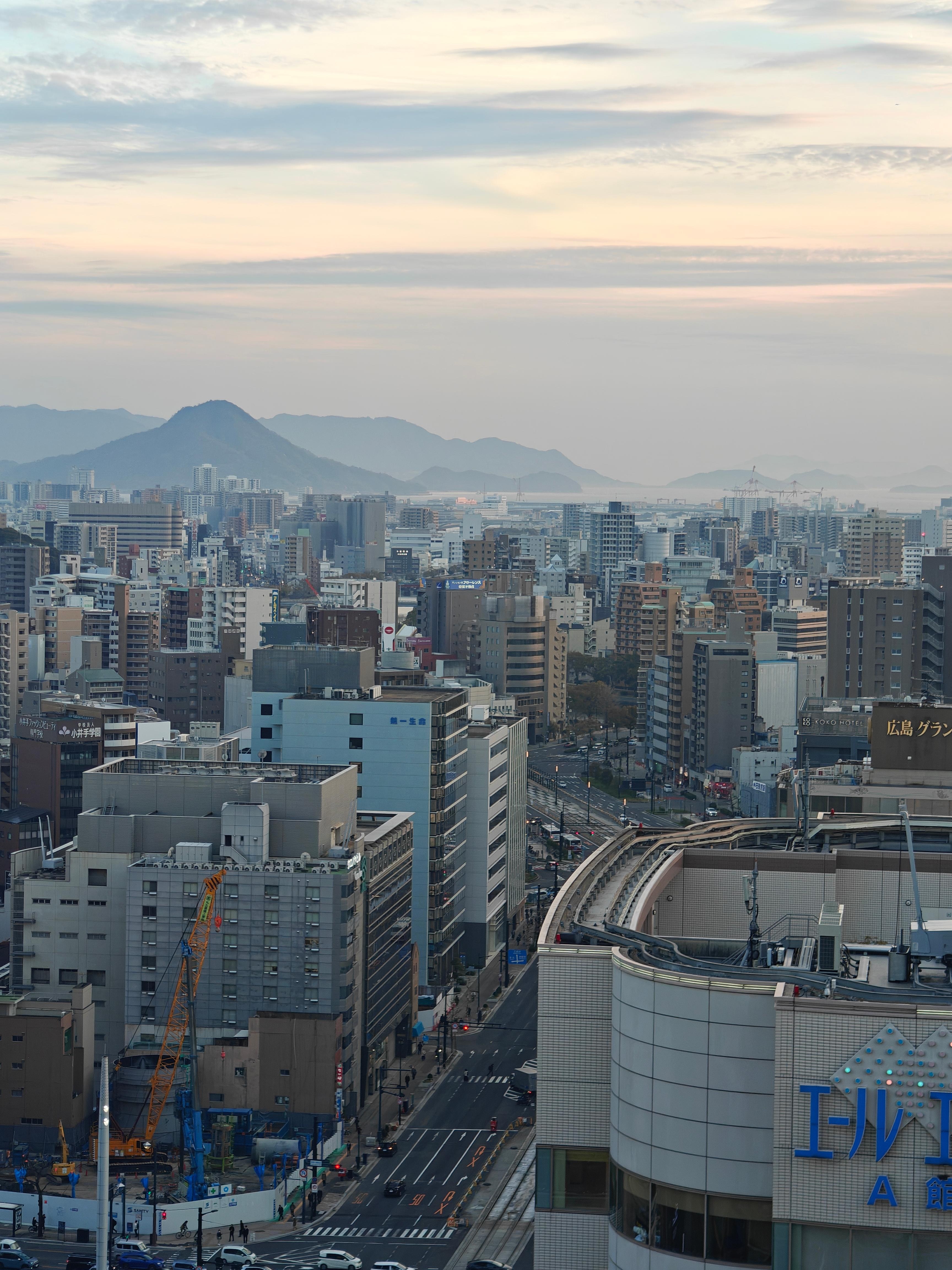 Sighted the mountain and sea beyond the city line.