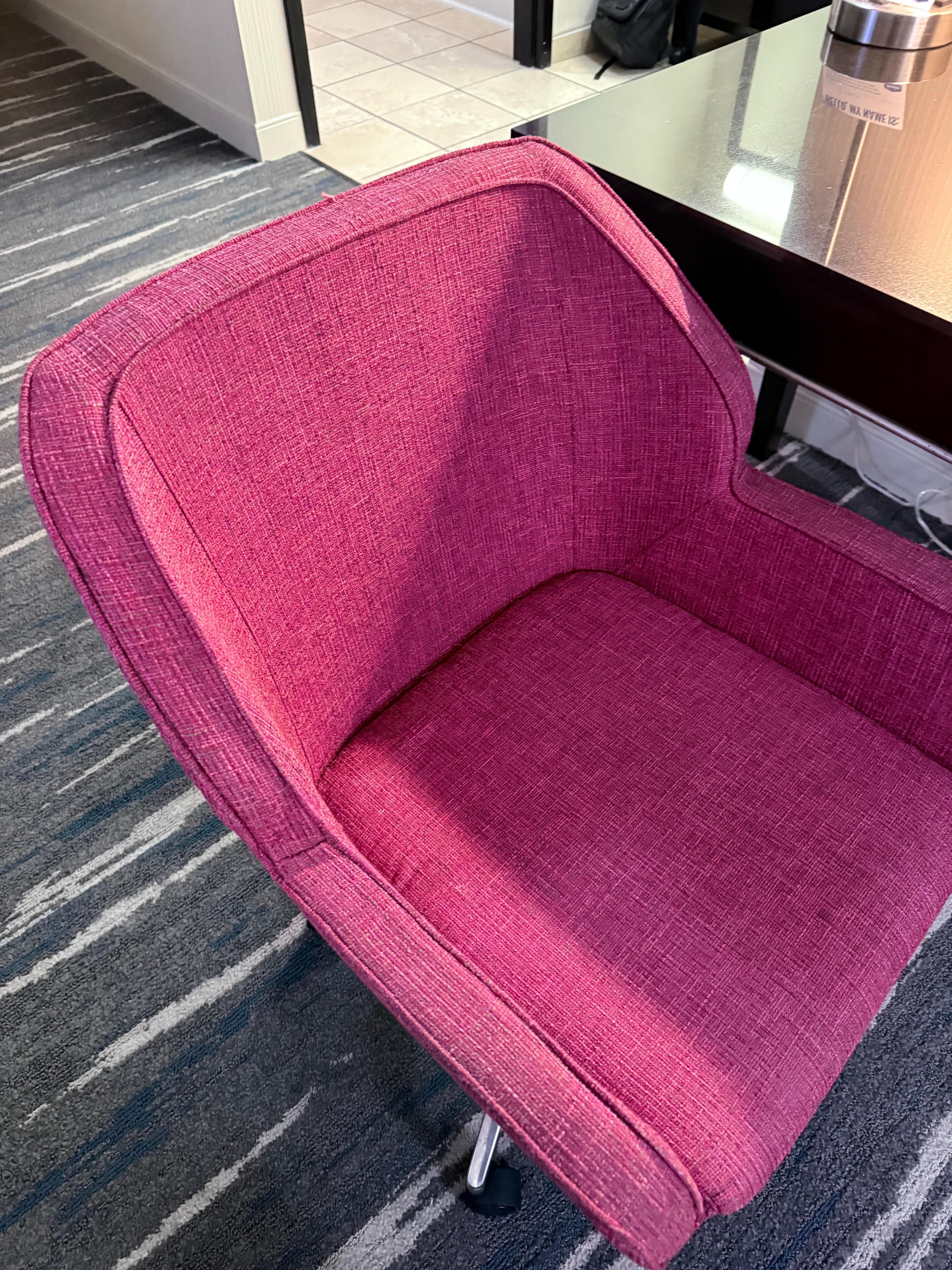 Dirty chair with frayed fabric