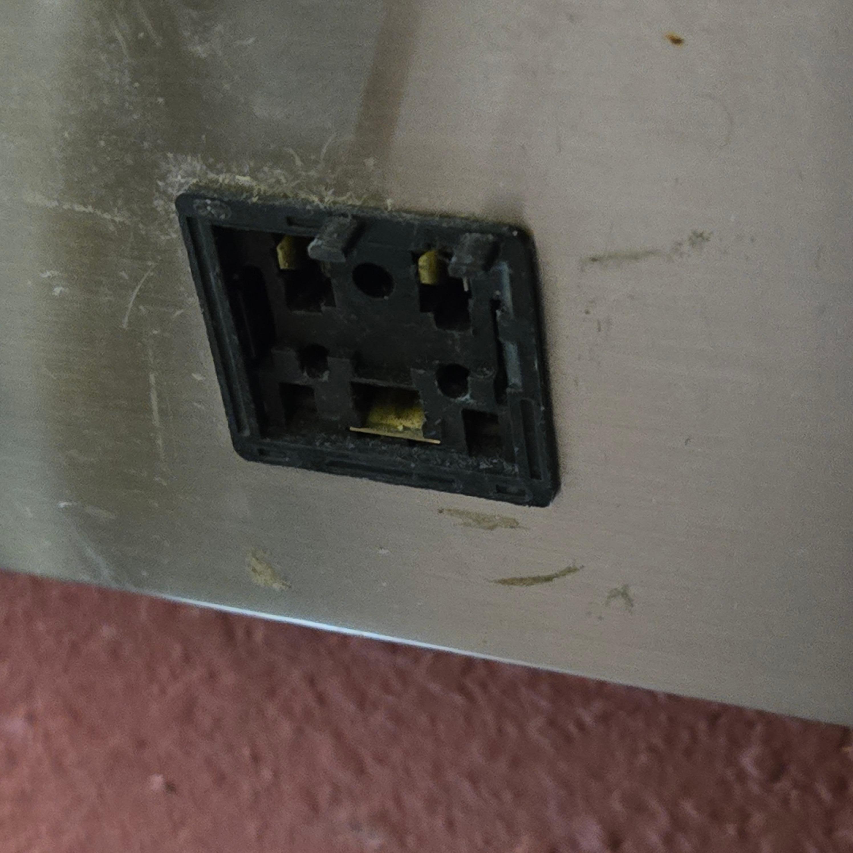 Broken outlets next to bed