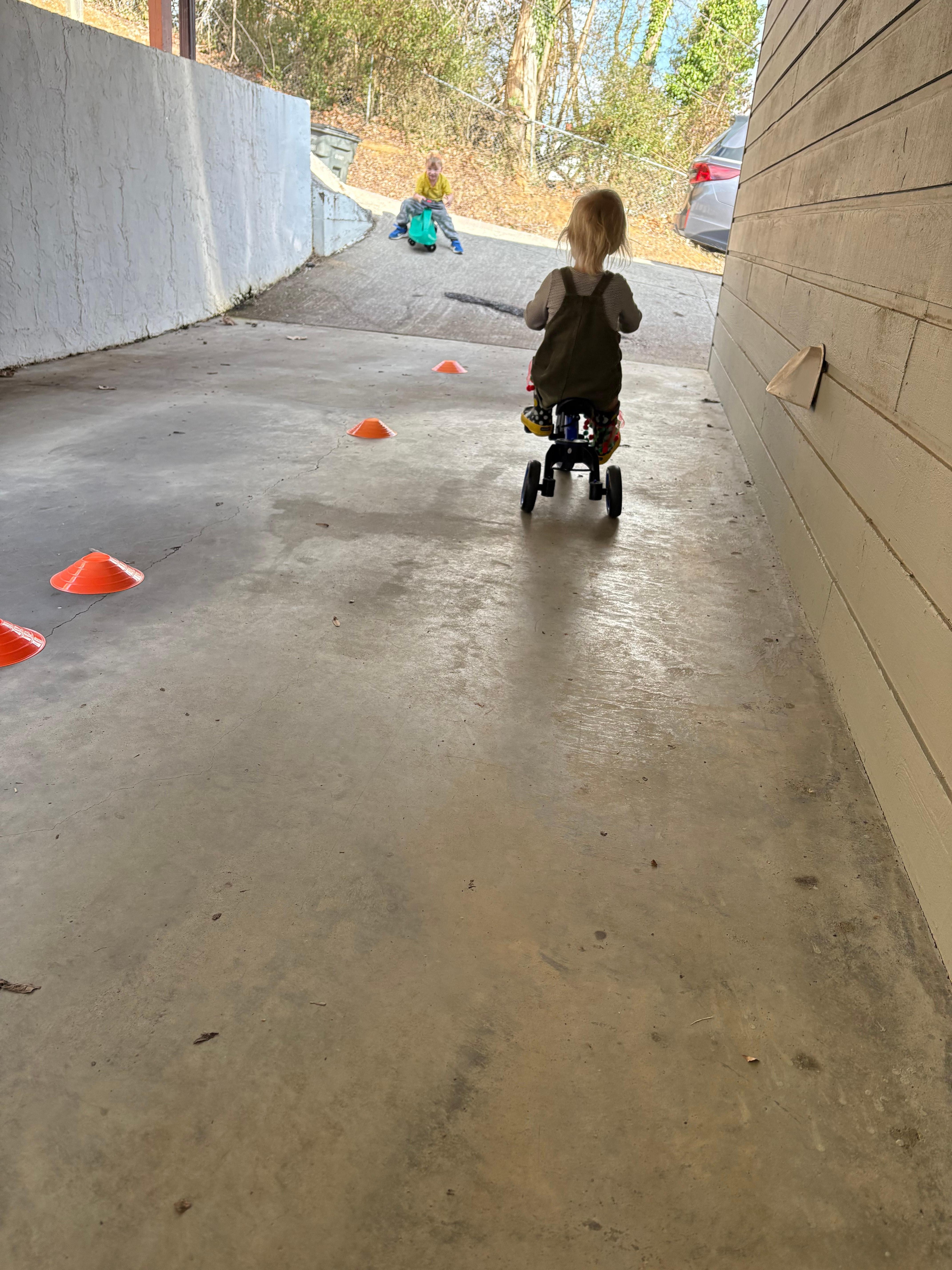 Carport was the level area for littles to ride on toys