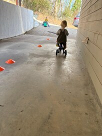 Carport was the level area for littles to ride on toys