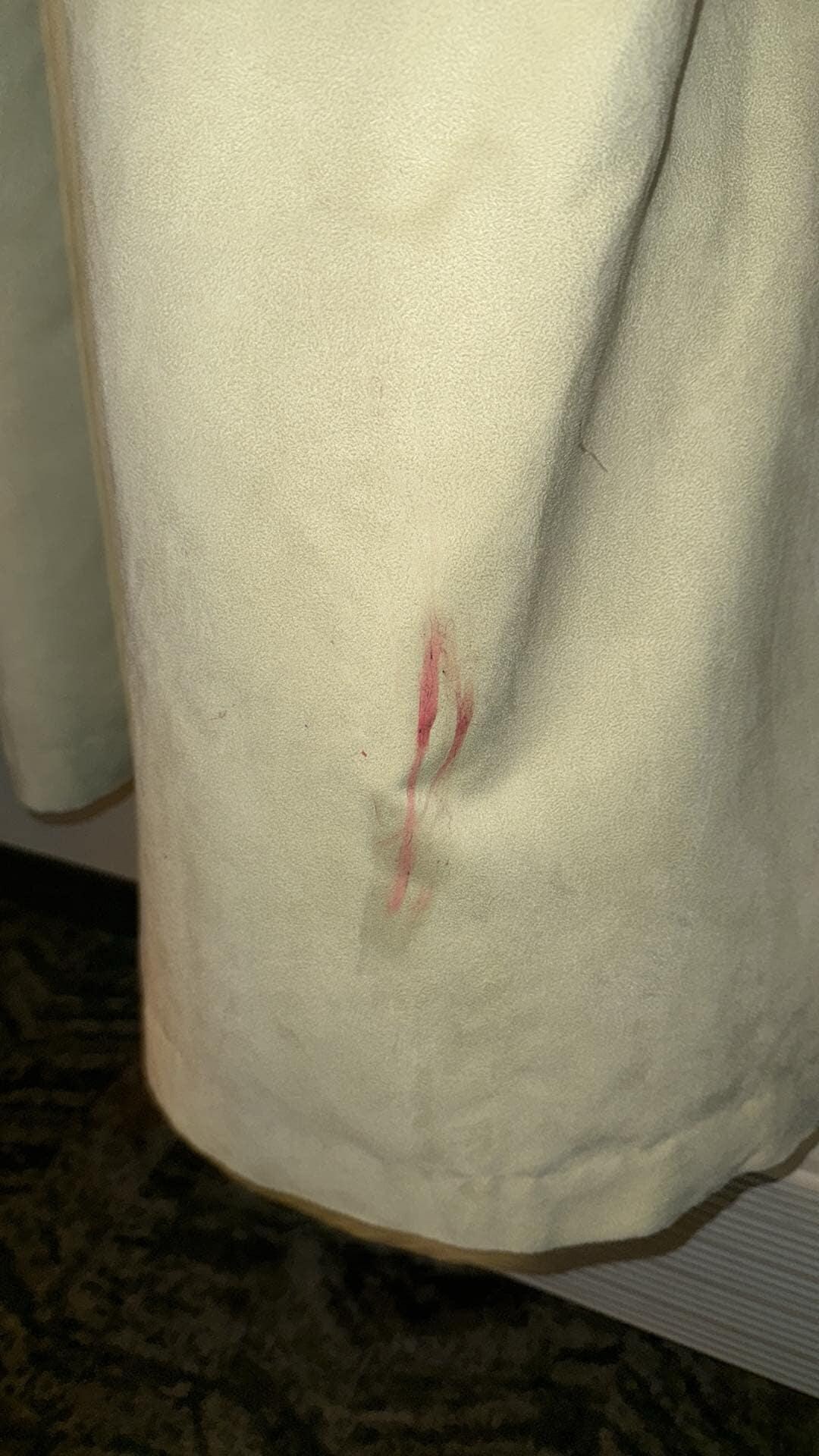 Red substance on curtain