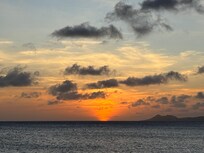 Watching the sunset from the private pier at the house.