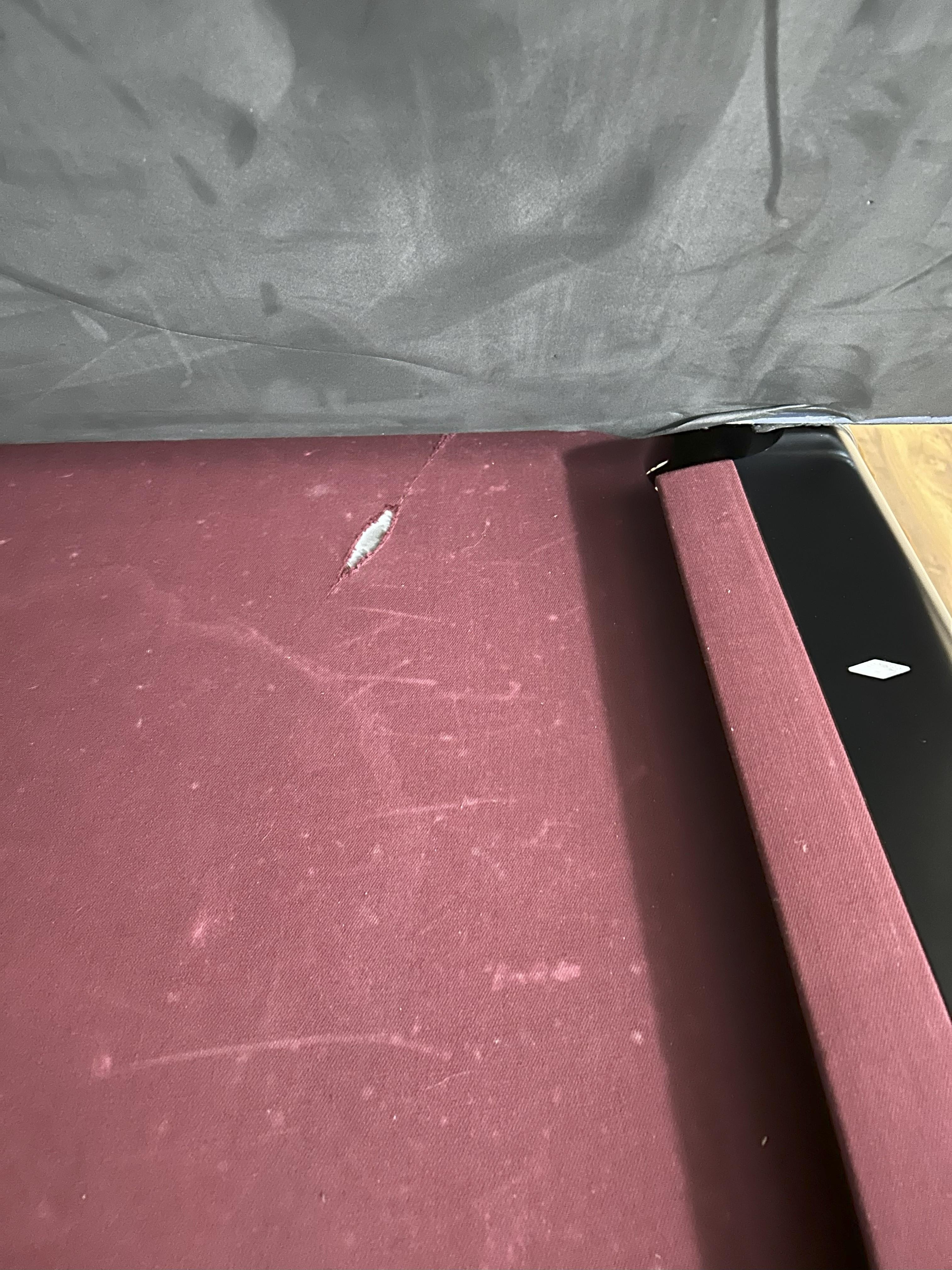 Ripped felt on pool table