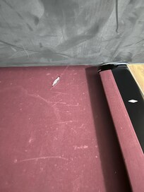 Ripped felt on pool table