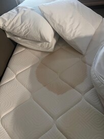 Stain on mattress in rm 238