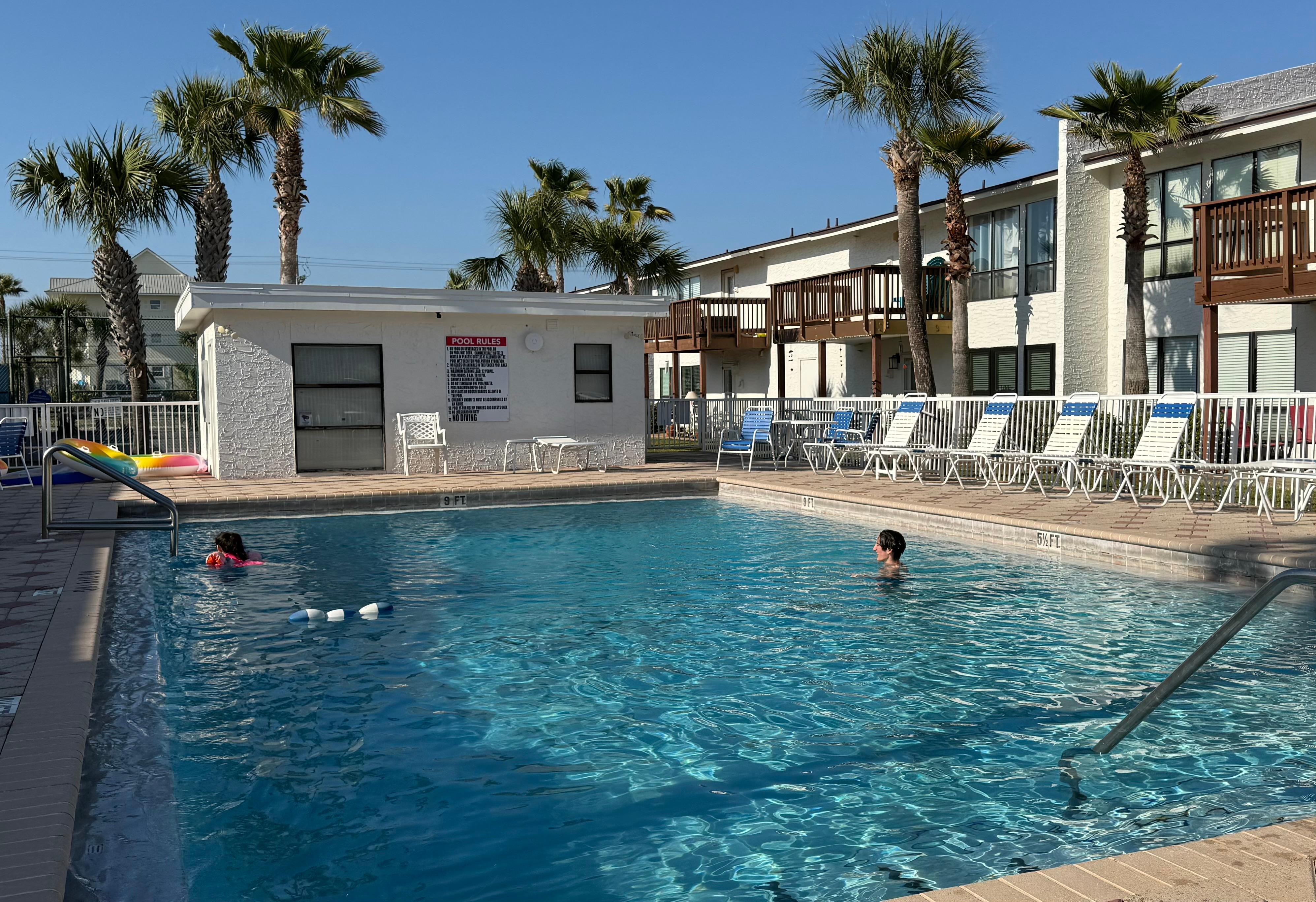 A pool included with Tennis courts on other side 