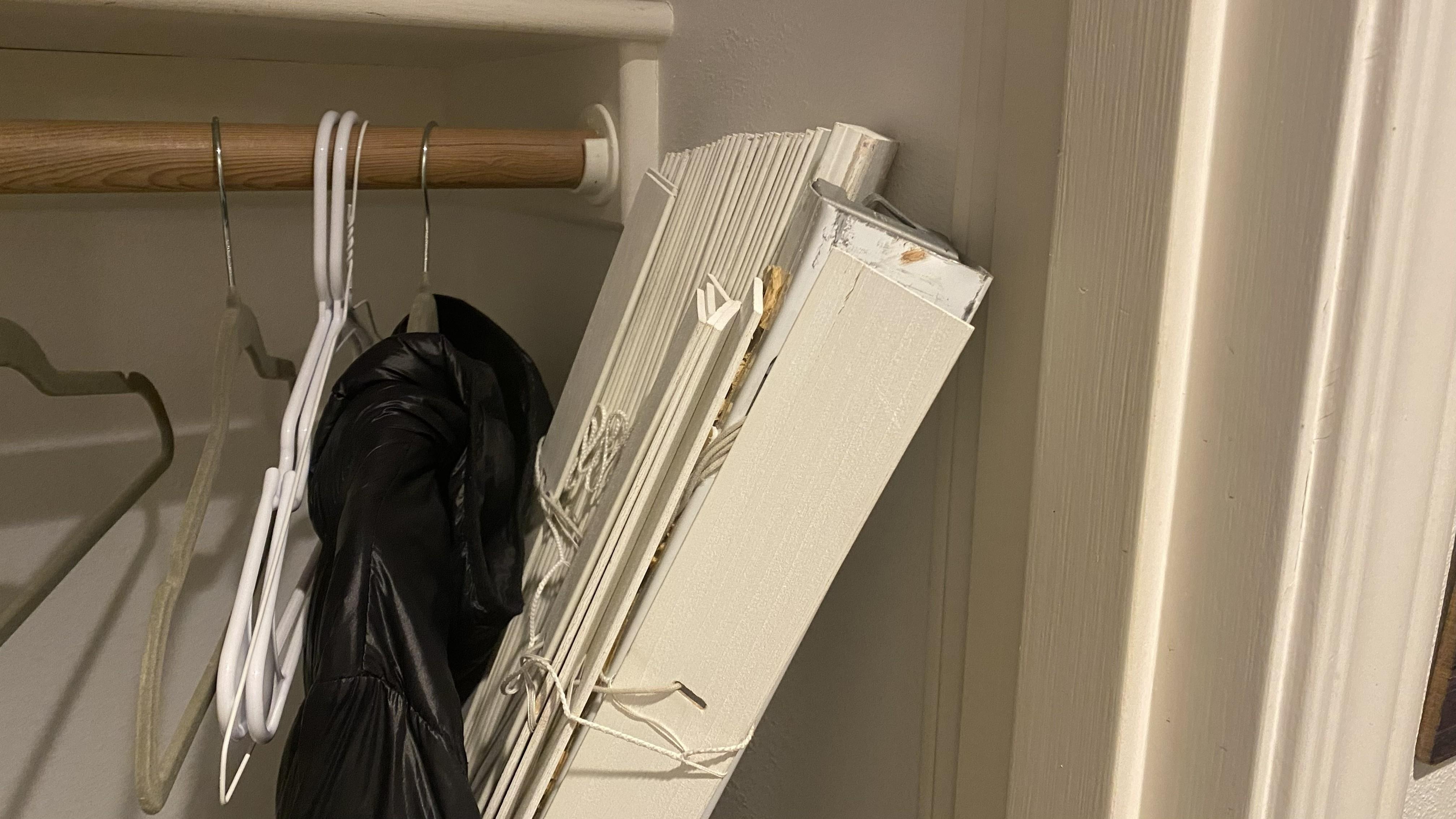 Broken set of blinds in the coat closet.