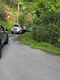 Stuck inside the cabin for hours due to not being told they were doing guard rail work on the only road that goes up and down to the cabin.