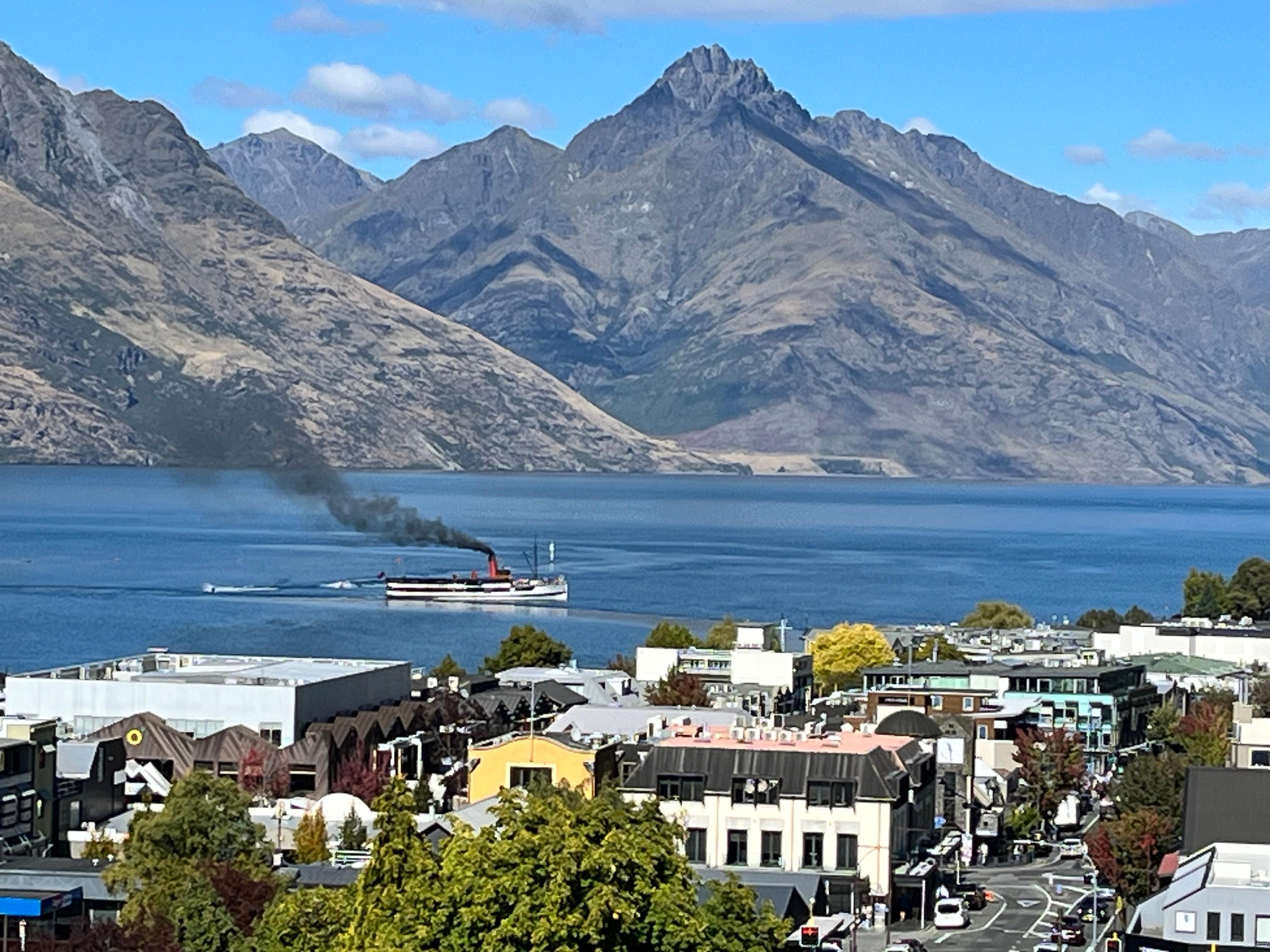 Steamer TSS Earnslaw coming into dock. Recommend the lake cruise and bbq lunch at Walter Peak Farm. 