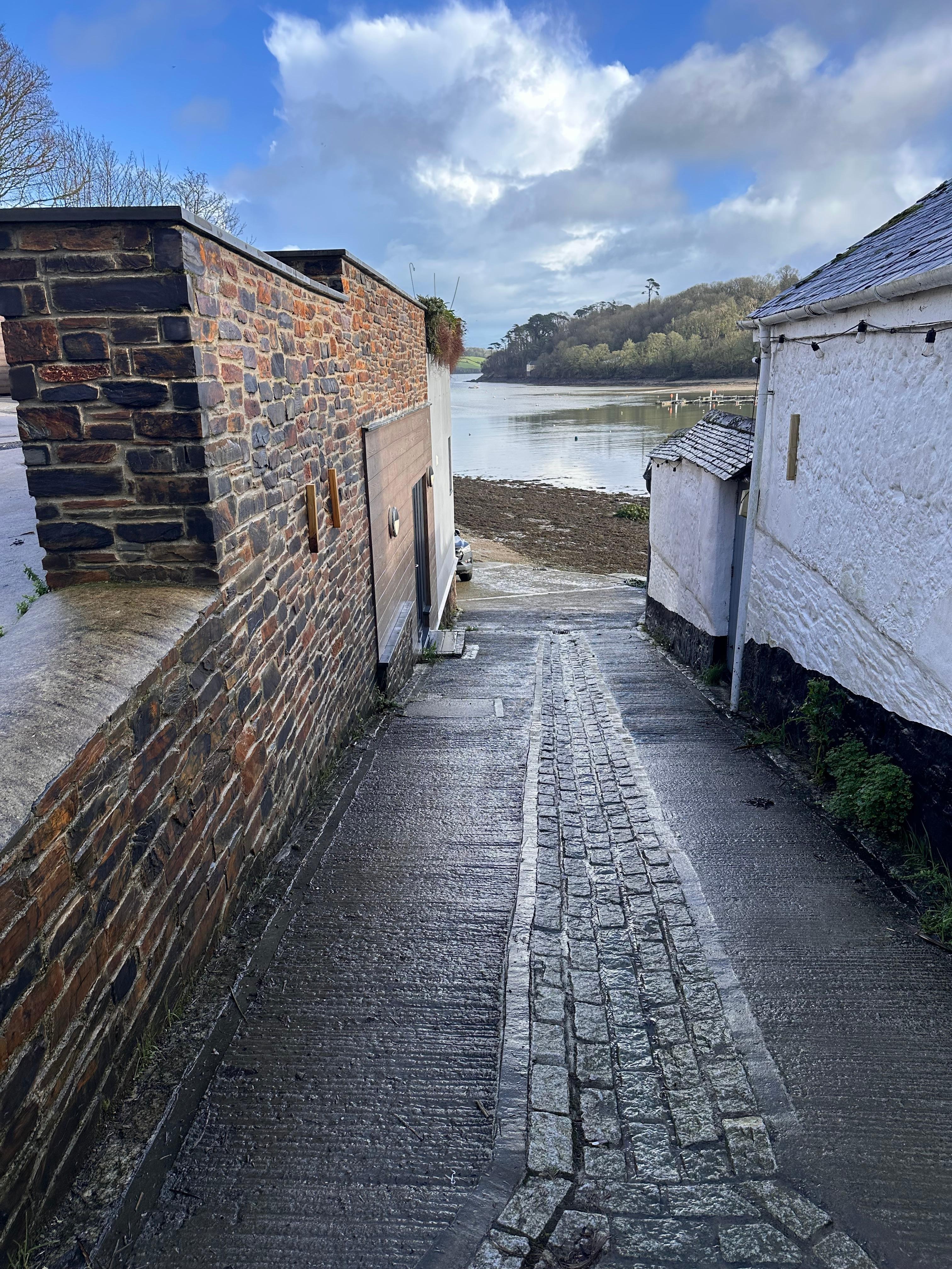 The slipway down to the rooms on the left