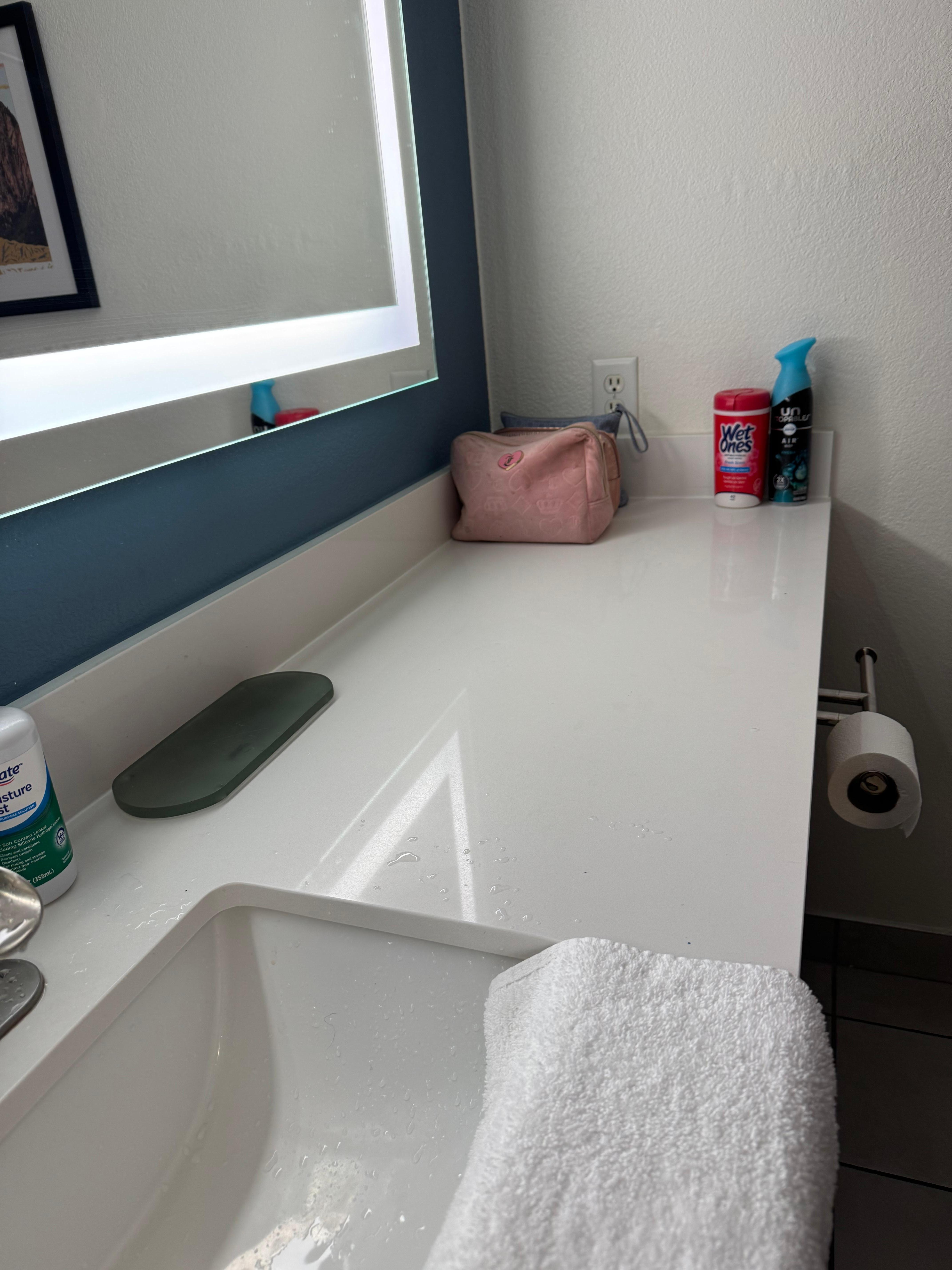 I loved the restroom mirror!! But it does need more lighting