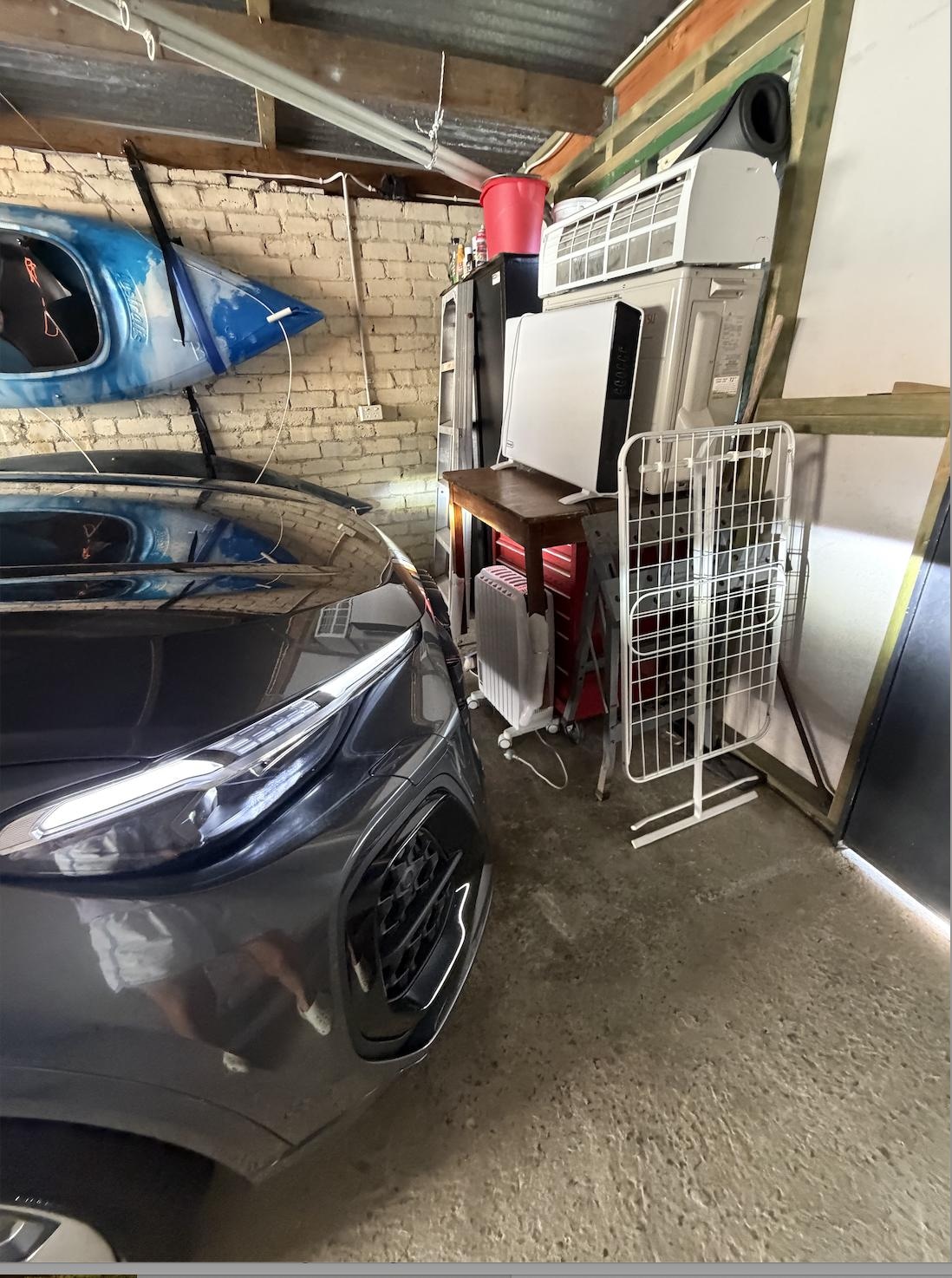 Clutter at front of garage