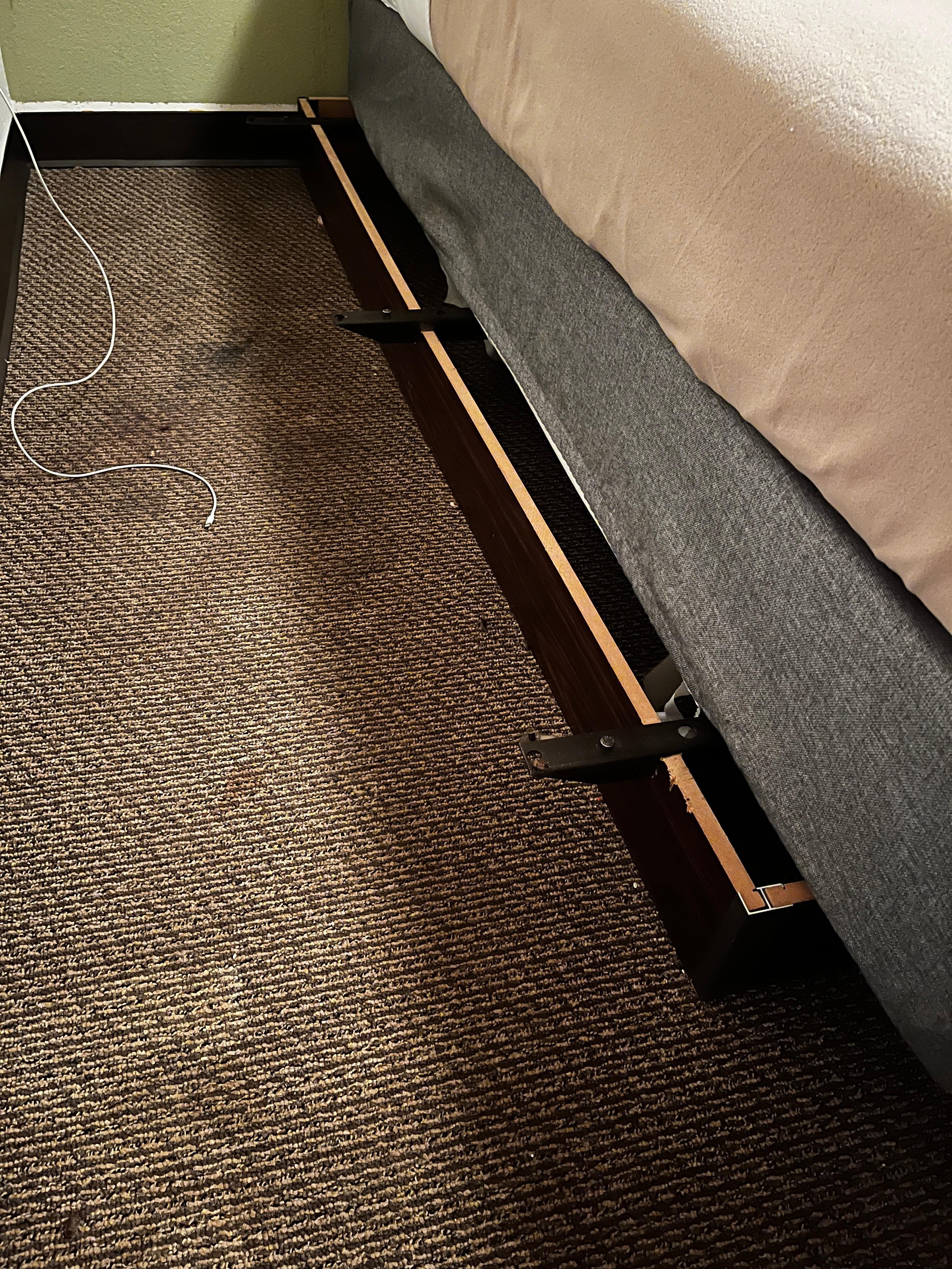 Bed was broken off the base and pushed over. Stains and dirty carpet.