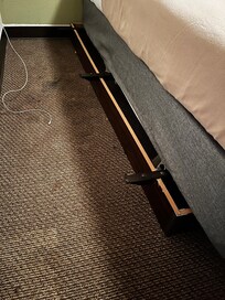 Bed was broken off the base and pushed over. Stains and dirty carpet.