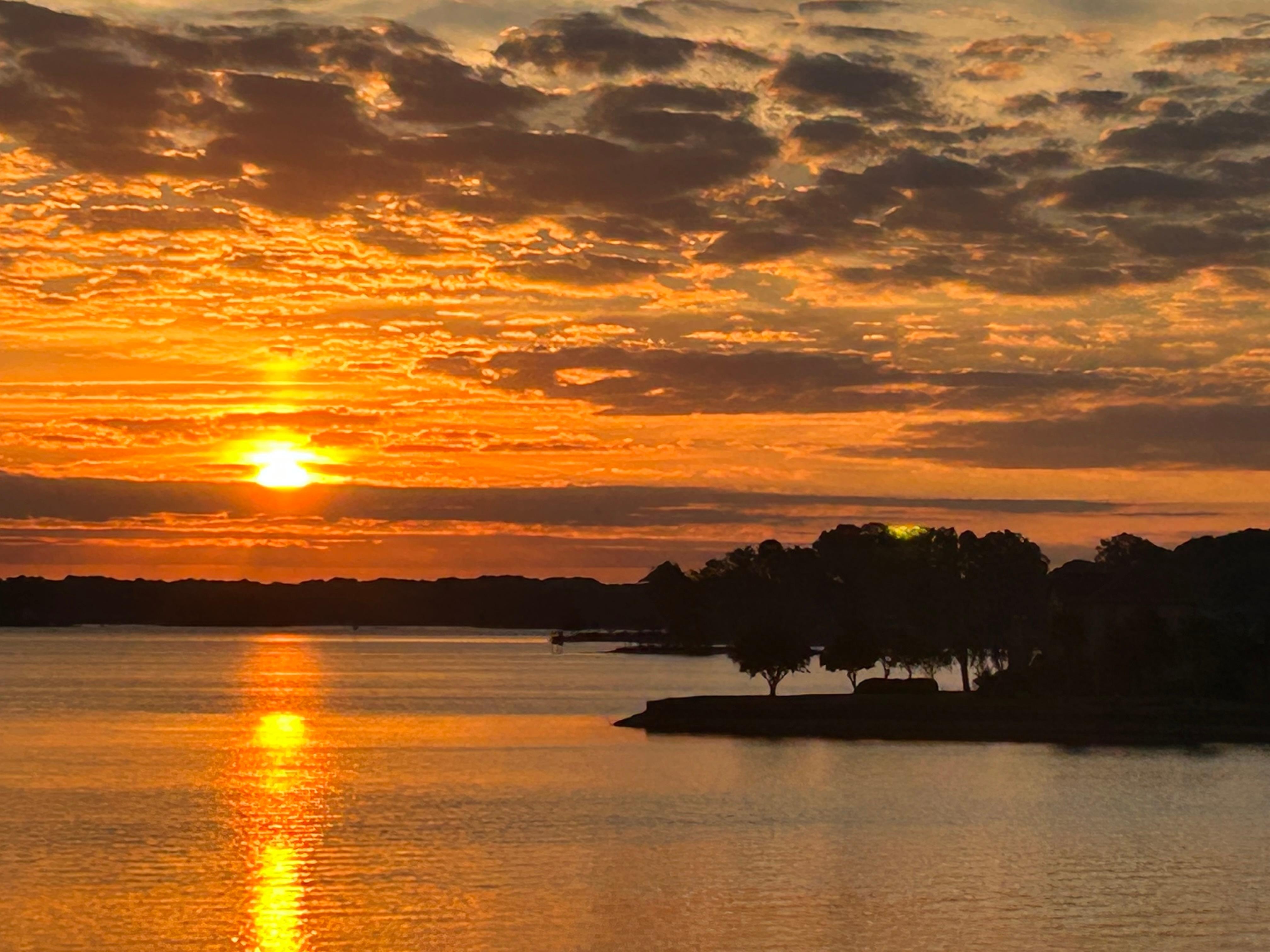 This was a sunrise just a short 2 min walk across the street. You can see the sunset on the lake from the property’s dock!