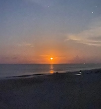 This was the rise of the “Strawberry Moon” over the ocean. About 5 min from beach access.