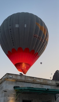 Hot air balloon passing over the hotel